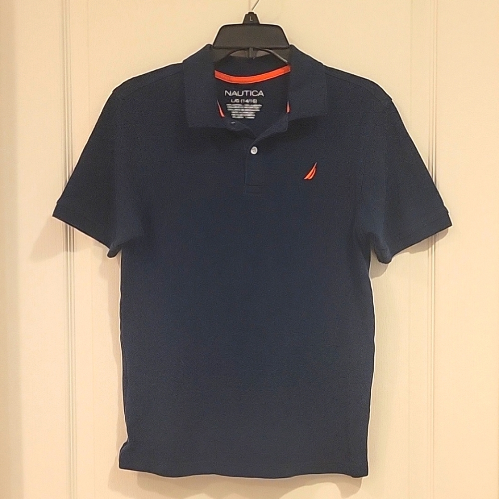 Boy's Nautica polo shirt. Navy blue with coral logo. Size Large (14/16).
